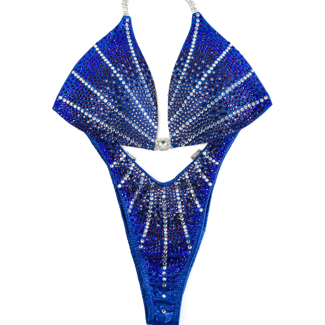 QS ST: Blue Amethyst Galaxy. Hologram Electric Blue. Medium Molded/Standard Figure with Modest Rise.  Angel Competition BikinisThe best NPC Competition Suits for the Bikini Division, Fit Model Division Suits, and bodybuilding suits.