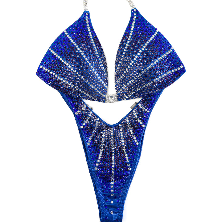 QS ST: Blue Amethyst Galaxy. Hologram Electric Blue. Medium Molded/Standard Figure with Modest Rise.  Angel Competition BikinisThe best NPC Competition Suits for the Bikini Division, Fit Model Division Suits, and bodybuilding suits.