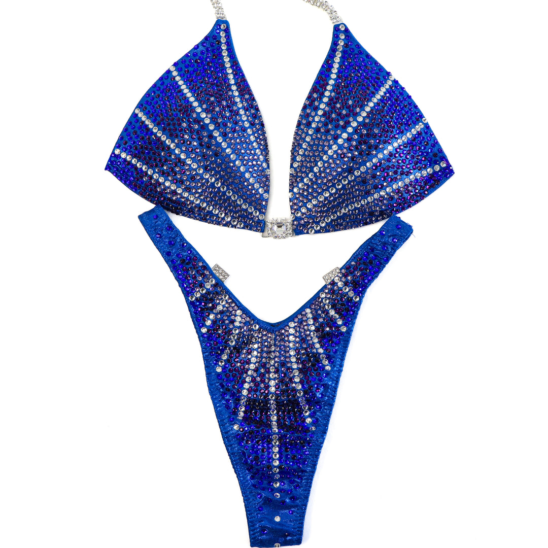QS ST: Blue Amethyst Galaxy. Hologram Electric Blue. Medium Molded/Standard Figure with Modest Rise.  Angel Competition BikinisThe best NPC Competition Suits for the Bikini Division, Fit Model Division Suits, and bodybuilding suits.