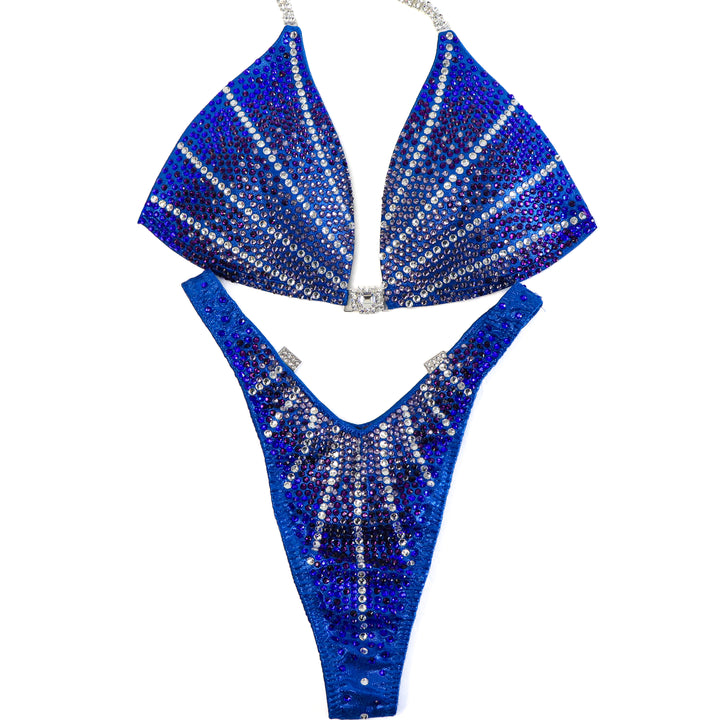 QS ST: Blue Amethyst Galaxy. Hologram Electric Blue. Medium Molded/Standard Figure with Modest Rise.  Angel Competition BikinisThe best NPC Competition Suits for the Bikini Division, Fit Model Division Suits, and bodybuilding suits.