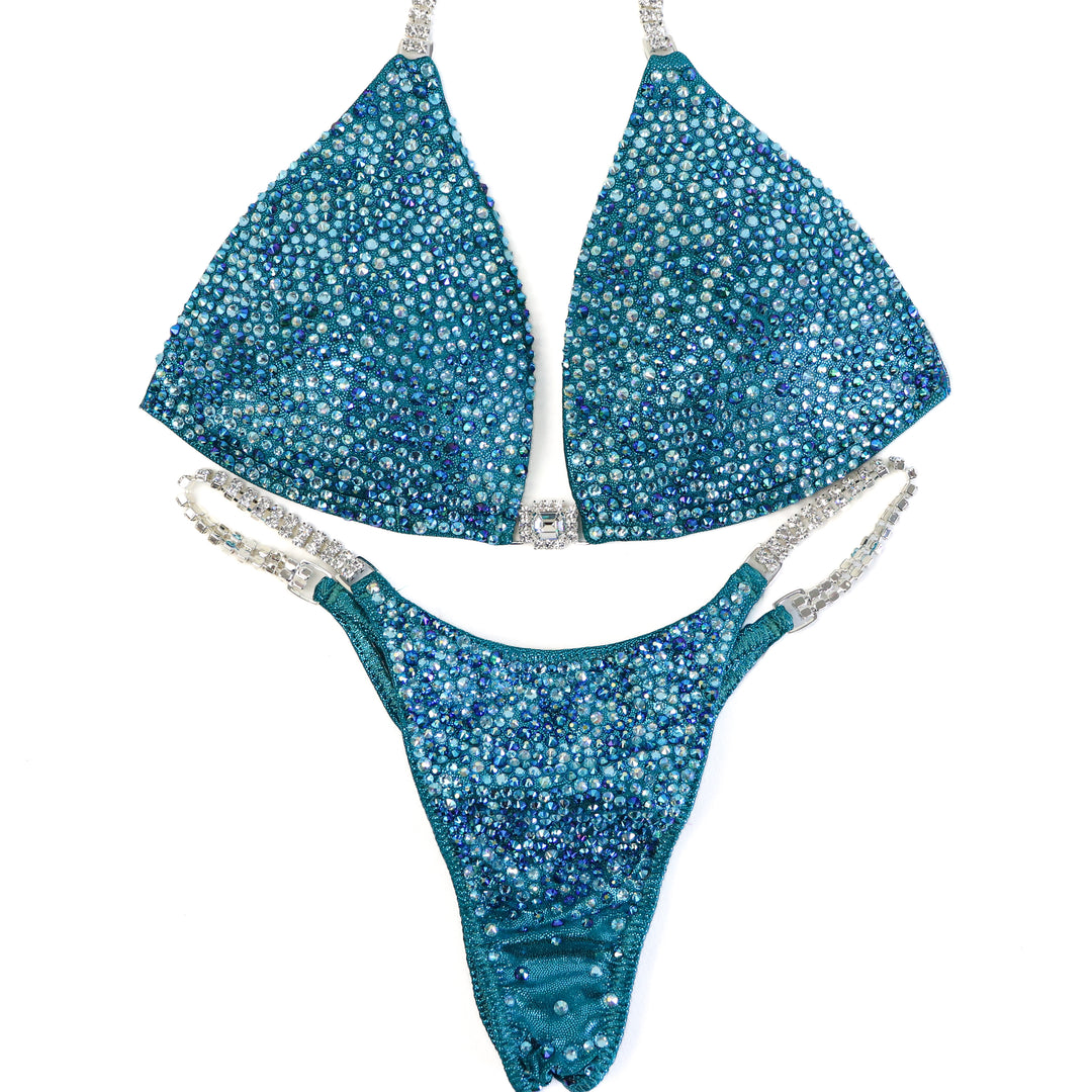 QS ST: Lucia's Teal Radiance. Medium Molded/Pro.  Angel Competition BikinisThe best NPC Competition Suits for the Bikini Division, Fit Model Division Suits, and bodybuilding suits.