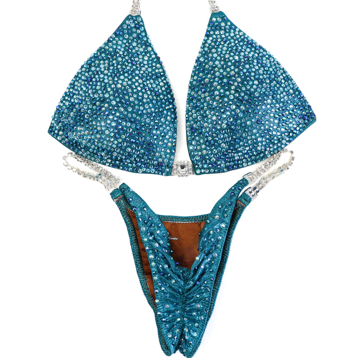 QS ST: Lucia's Teal Radiance. Medium Molded/Pro.  Angel Competition BikinisThe best NPC Competition Suits for the Bikini Division, Fit Model Division Suits, and bodybuilding suits.