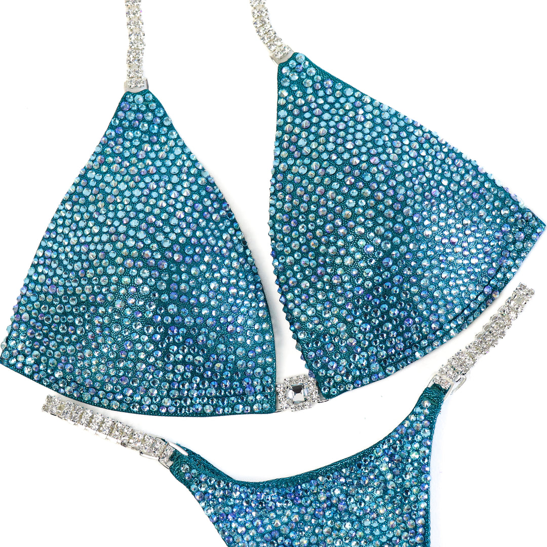 Holly's Deep Aqua Radiance  Angel Competition BikinisThe best NPC Competition Suits for the Bikini Division, Fit Model Division Suits, and bodybuilding suits.