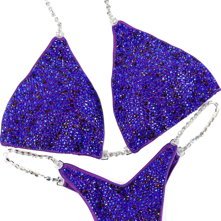Pre Owned: Blurple Radiance. Medium/Micro with Petite Rise.  Angel Competition BikinisThe best NPC Competition Suits for the Bikini Division, Fit Model Division Suits, and bodybuilding suits.