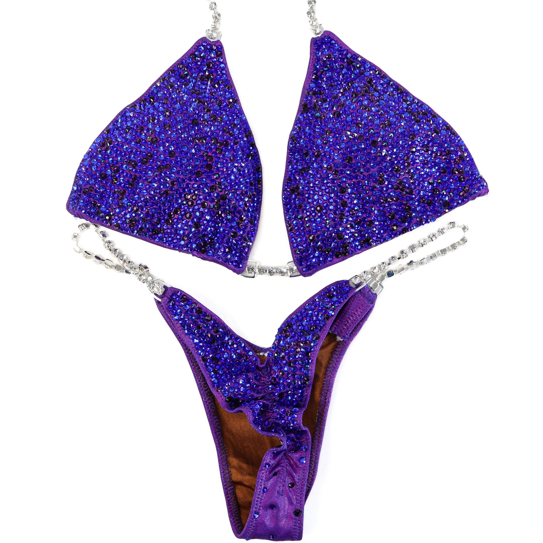 Pre Owned: Blurple Radiance. Medium/Micro with Petite Rise.  Angel Competition BikinisThe best NPC Competition Suits for the Bikini Division, Fit Model Division Suits, and bodybuilding suits.