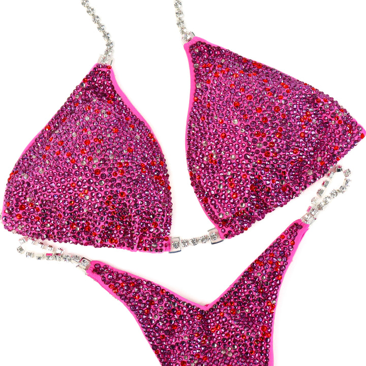 Pre Owned: Pink Amethyst Radiance. Medium/Micro with Petite Rise, Extreme V.  Angel Competition BikinisThe best NPC Competition Suits for the Bikini Division, Fit Model Division Suits, and bodybuilding suits.