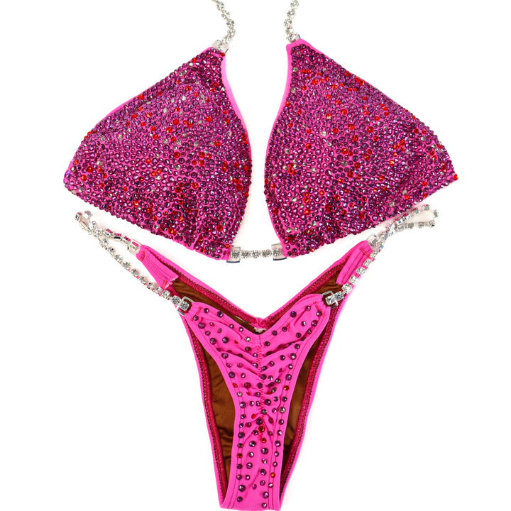 Pre Owned: Pink Amethyst Radiance. Medium/Micro with Petite Rise, Extreme V.  Angel Competition BikinisThe best NPC Competition Suits for the Bikini Division, Fit Model Division Suits, and bodybuilding suits.