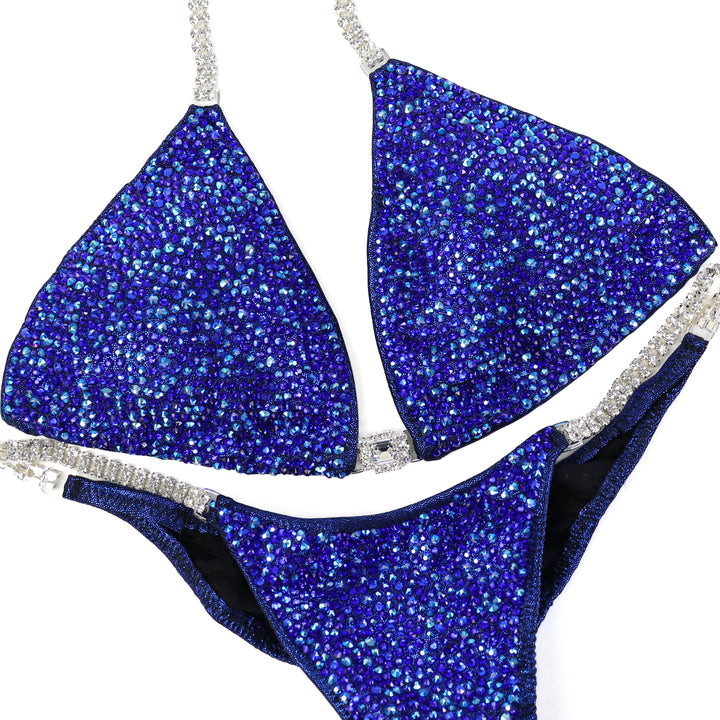 QS ST: Mystic Blue Radiance. Medium/Brazilian with Modest Rise.  Angel Competition BikinisThe best NPC Competition Suits for the Bikini Division, Fit Model Division Suits, and bodybuilding suits.