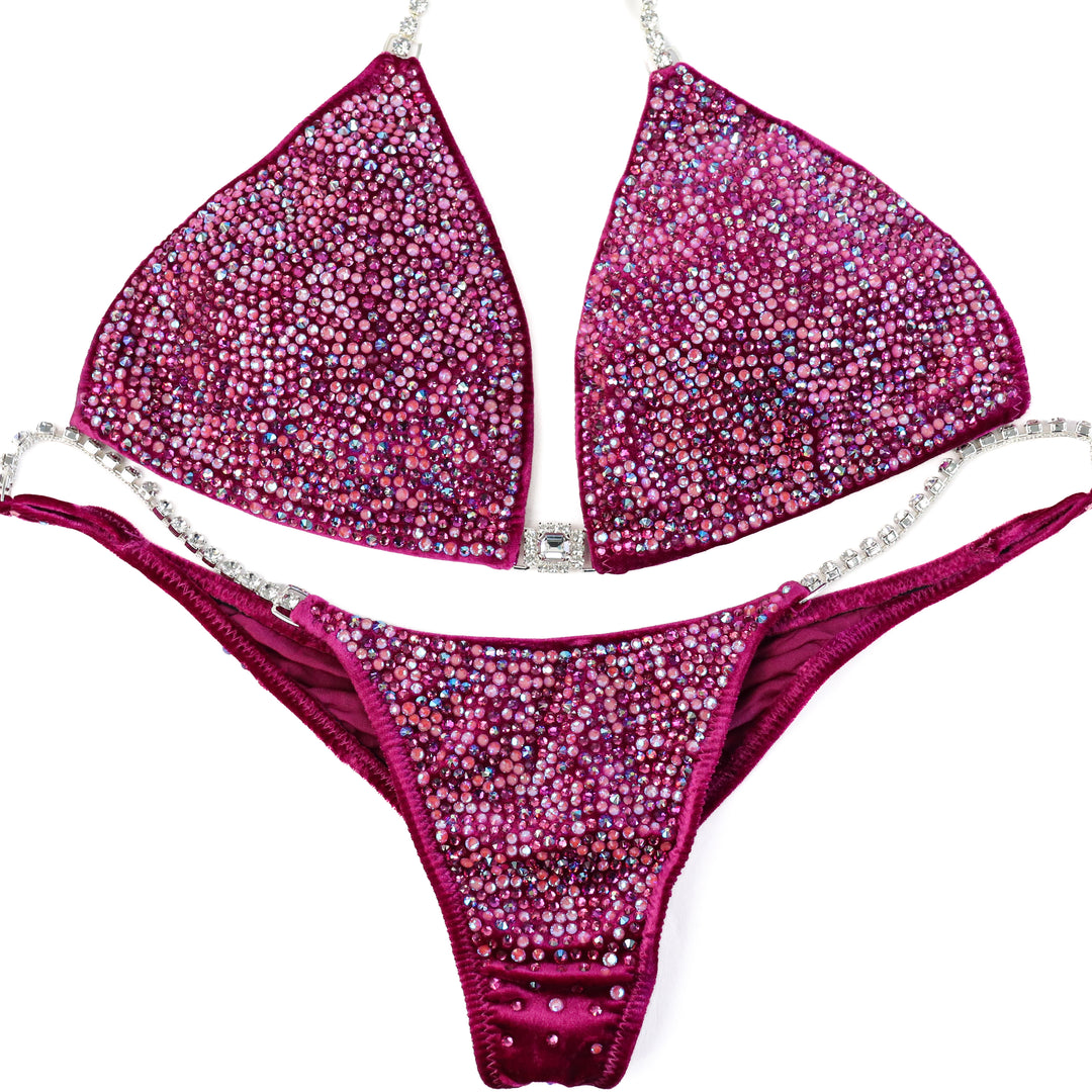 QS ST: Victoria's Arnold Velvet Magenta Radiance. Large/Brazilian with Modest Rise.  Angel Competition BikinisThe best NPC Competition Suits for the Bikini Division, Fit Model Division Suits, and bodybuilding suits.