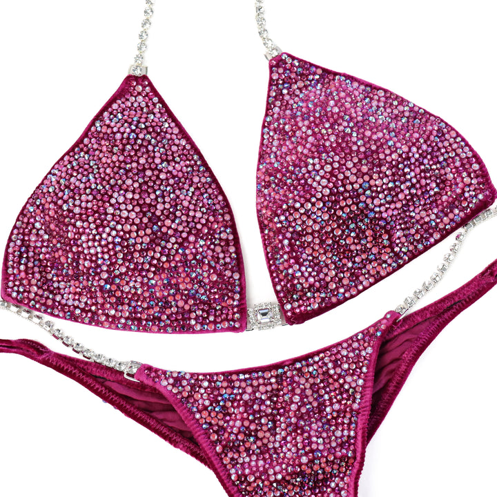 QS ST: Victoria's Arnold Velvet Magenta Radiance. Large/Brazilian with Modest Rise.  Angel Competition BikinisThe best NPC Competition Suits for the Bikini Division, Fit Model Division Suits, and bodybuilding suits.