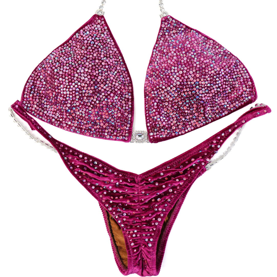 QS ST: Victoria's Arnold Velvet Magenta Radiance. Large/Brazilian with Modest Rise.  Angel Competition BikinisThe best NPC Competition Suits for the Bikini Division, Fit Model Division Suits, and bodybuilding suits.