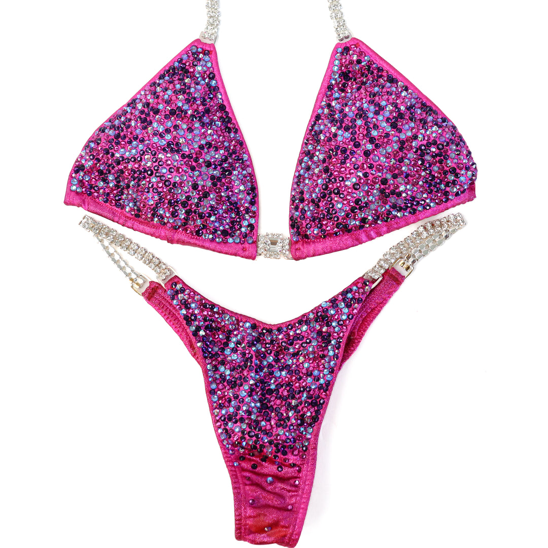 Pre Owned: Dustee's Pink Radiance. Small/Pro.  Angel Competition BikinisThe best NPC Competition Suits for the Bikini Division, Fit Model Division Suits, and bodybuilding suits.