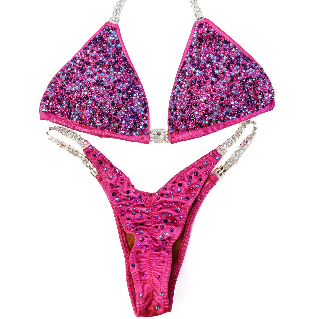 Pre Owned: Dustee's Pink Radiance. Small/Pro.  Angel Competition BikinisThe best NPC Competition Suits for the Bikini Division, Fit Model Division Suits, and bodybuilding suits.
