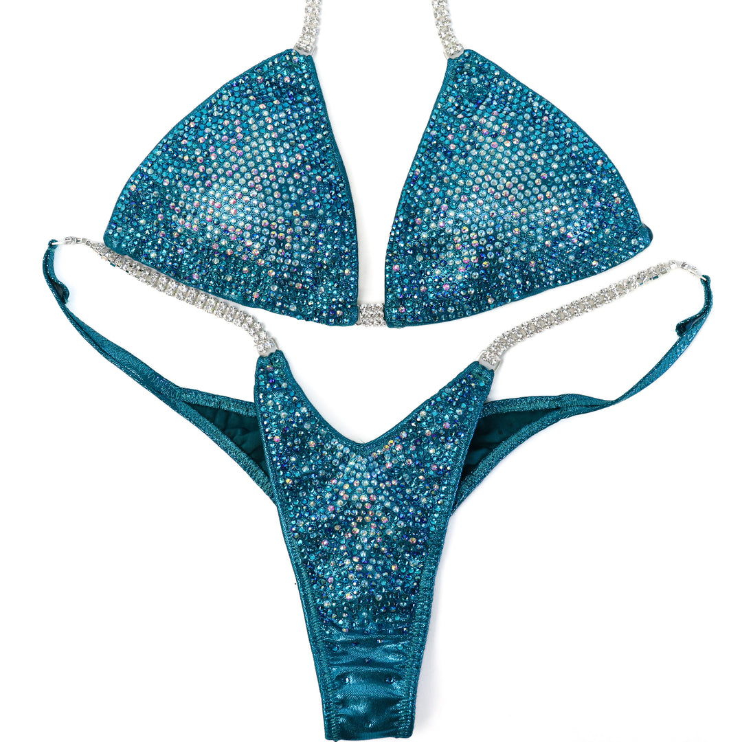 QS ST: Teal Nova. Medium/Pro with Modest Rise.  Angel Competition BikinisThe best NPC Competition Suits for the Bikini Division, Fit Model Division Suits, and bodybuilding suits.