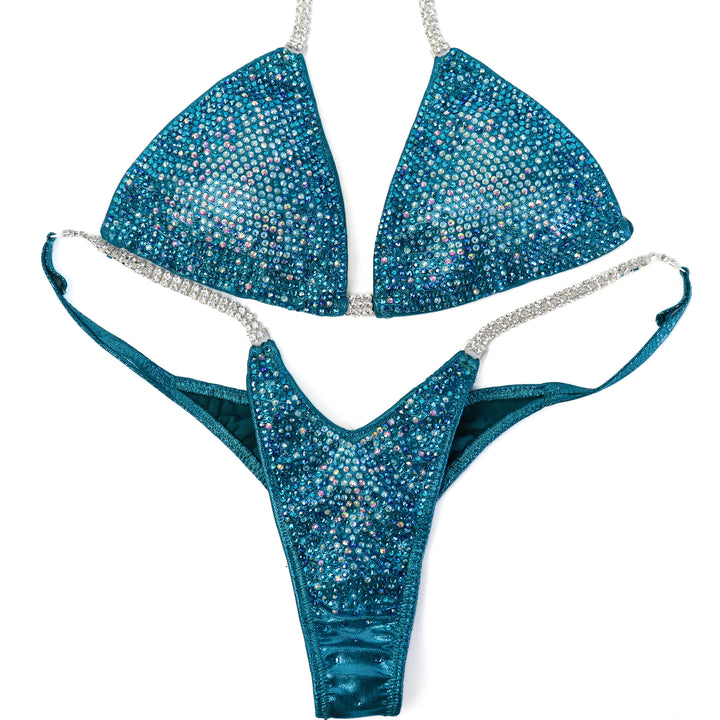 QS ST: Teal Nova. Medium/Pro with Modest Rise.  Angel Competition BikinisThe best NPC Competition Suits for the Bikini Division, Fit Model Division Suits, and bodybuilding suits.