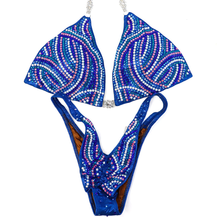 QS CL: Tessa's Blue Olympian Crystal Swirl. Large/Standard with Petite Rise.  Angel Competition BikinisThe best NPC Competition Suits for the Bikini Division, Fit Model Division Suits, and bodybuilding suits.