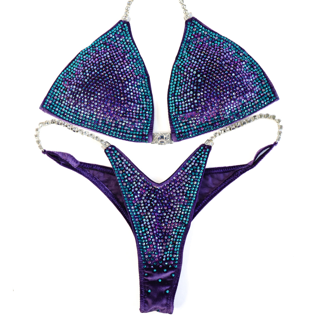 QS ST: Crystal Nova 3 Color. Velvet Purple. Medium/Pro with Modest Rise.  Angel Competition BikinisThe best NPC Competition Suits for the Bikini Division, Fit Model Division Suits, and bodybuilding suits.