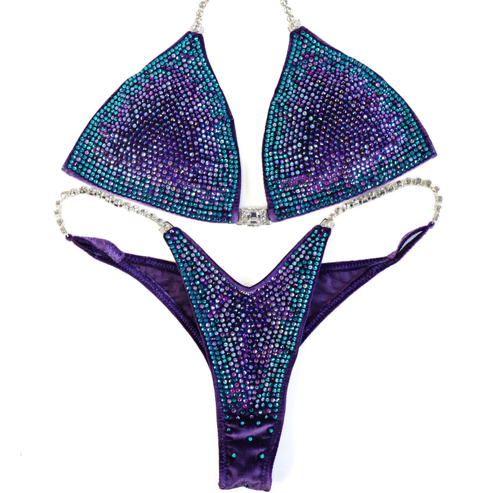 QS ST: Crystal Nova 3 Color. Velvet Purple. Medium/Pro with Modest Rise.  Angel Competition BikinisThe best NPC Competition Suits for the Bikini Division, Fit Model Division Suits, and bodybuilding suits.