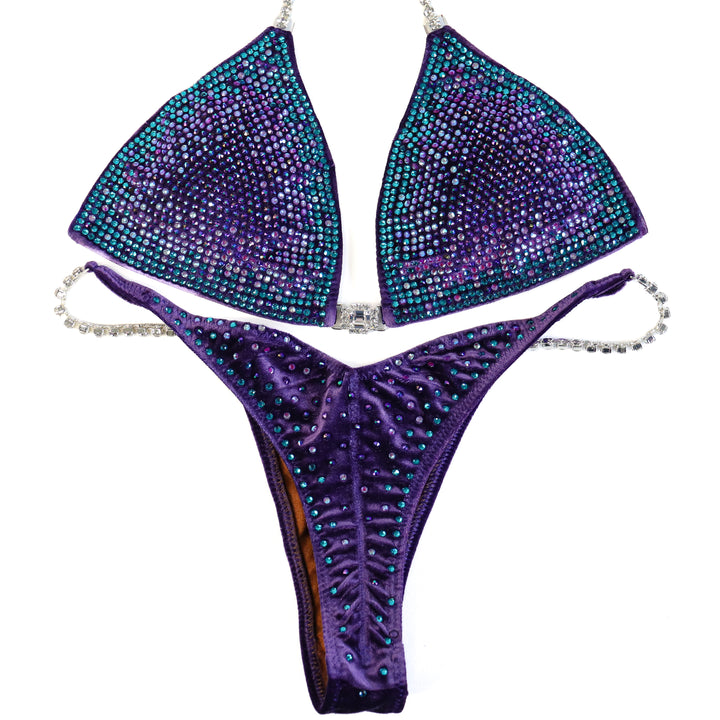 QS ST: Crystal Nova 3 Color. Velvet Purple. Medium/Pro with Modest Rise.  Angel Competition BikinisThe best NPC Competition Suits for the Bikini Division, Fit Model Division Suits, and bodybuilding suits.
