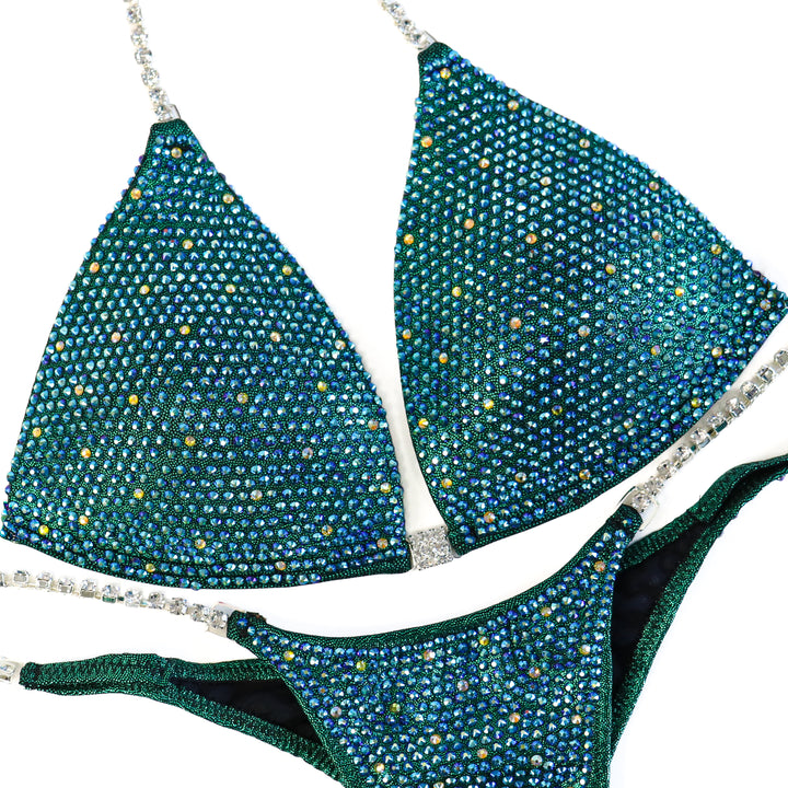 QS ST: Angel Shimmer. Hologram Emerald. Medium Molded/Pro.  Angel Competition BikinisThe best NPC Competition Suits for the Bikini Division, Fit Model Division Suits, and bodybuilding suits.