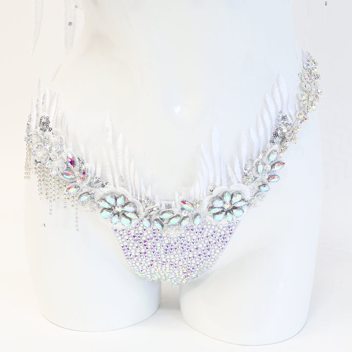White couture bikini on a mannequin against a white background