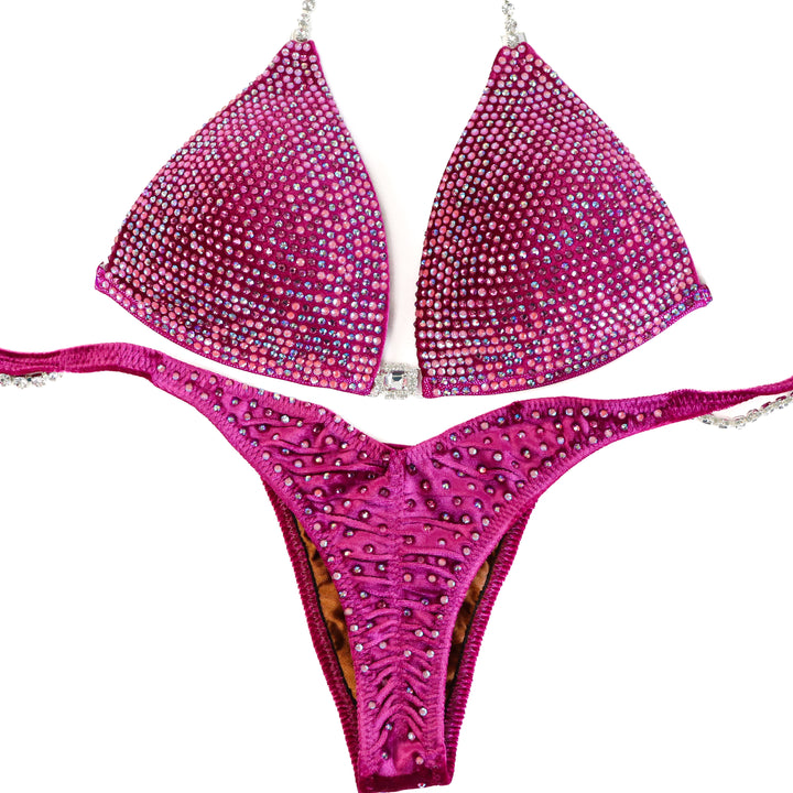 QS ST: Velvet Magenta Crystal Nova. Medium Molded/Pro with Modest Rise  Angel Competition BikinisThe best NPC Competition Suits for the Bikini Division, Fit Model Division Suits, and bodybuilding suits.