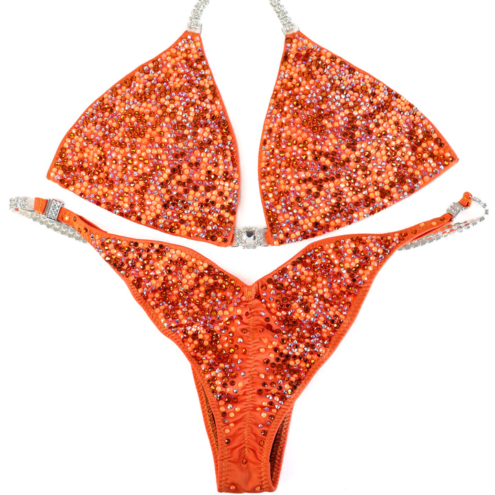QS ST: Julia's Orange Glow Radiance. Medium/Brazilian.  Angel Competition BikinisThe best NPC Competition Suits for the Bikini Division, Fit Model Division Suits, and bodybuilding suits.