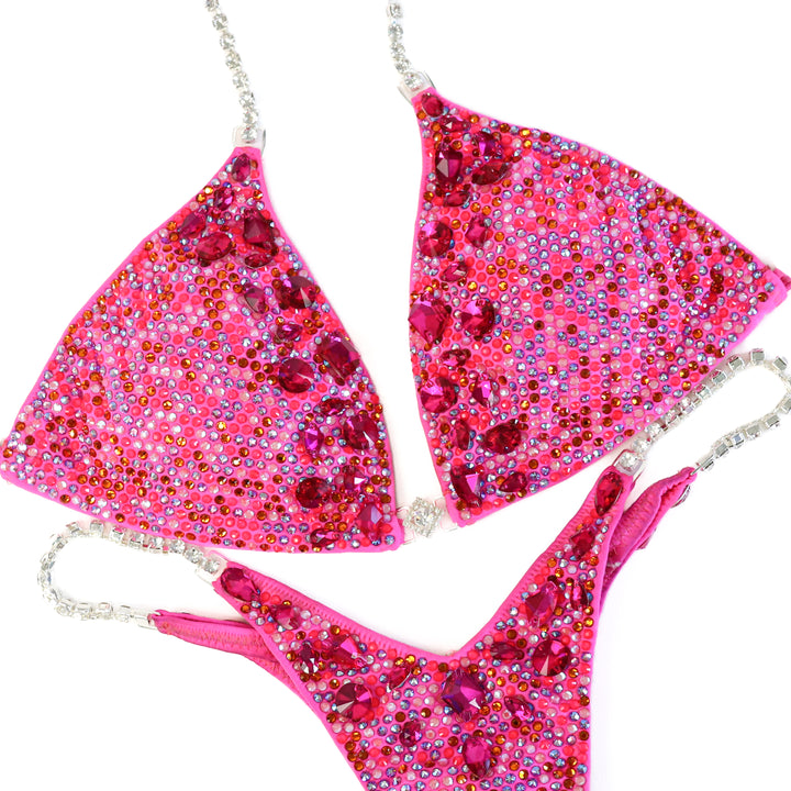 Pre Owned: Pink Platinum Ombre. Medium/Micro with Petite Rise.  Angel Competition BikinisThe best NPC Competition Suits for the Bikini Division, Fit Model Division Suits, and bodybuilding suits.