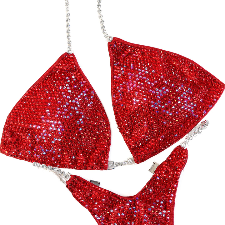 Pre Owned: Ashley K's Cherry Bomb Cascade. Large/Slim Figure.  Angel Competition BikinisThe best NPC Competition Suits for the Bikini Division, Fit Model Division Suits, and bodybuilding suits.