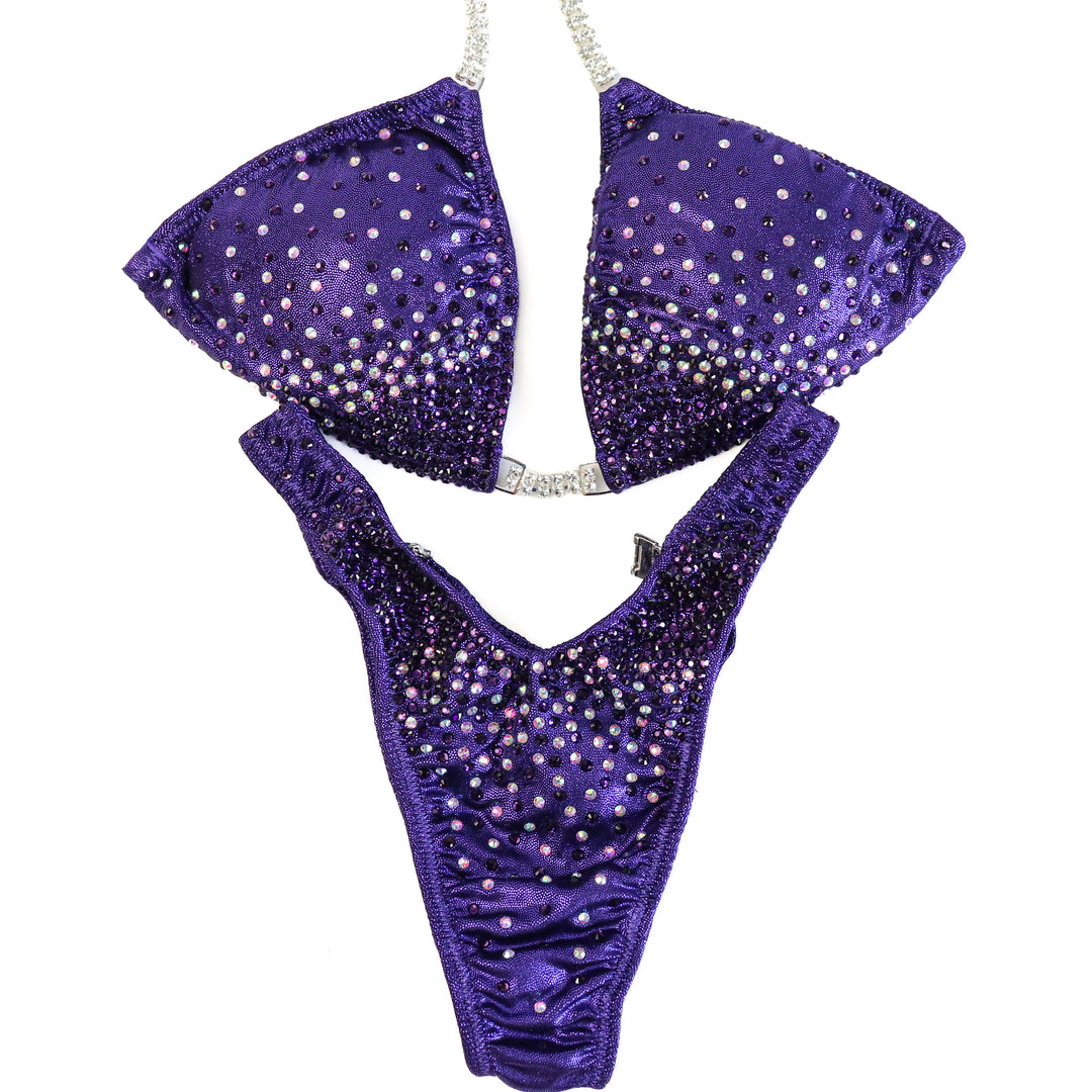 QS ST: Angel Firework. Hologram Eggplant. Medium/Standard Figure.  Angel Competition BikinisThe best NPC Competition Suits for the Bikini Division, Fit Model Division Suits, and bodybuilding suits.