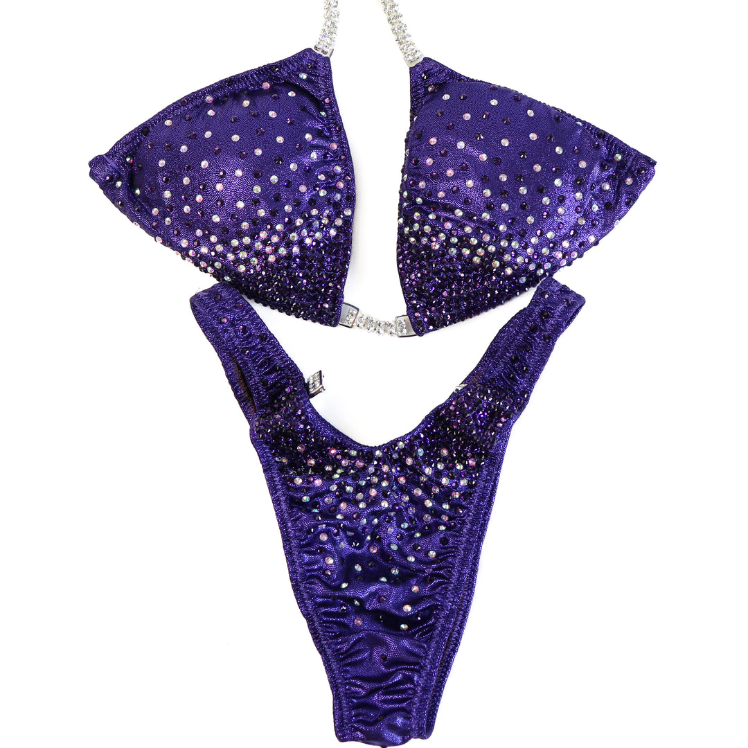 QS ST: Angel Firework. Hologram Eggplant. Medium/Standard Figure.  Angel Competition BikinisThe best NPC Competition Suits for the Bikini Division, Fit Model Division Suits, and bodybuilding suits.