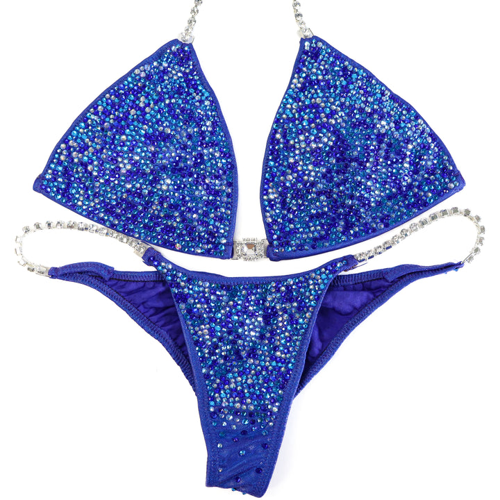 QS ST: Crystal Radiance. Hologram Electric Purple. Large/Pro with Modest Rise.  Angel Competition BikinisThe best NPC Competition Suits for the Bikini Division, Fit Model Division Suits, and bodybuilding suits.