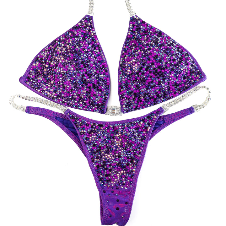 QS ST: Neon Purple Breeze Radiance. Extra Large/Pro with Modest Rise.  Angel Competition BikinisThe best NPC Competition Suits for the Bikini Division, Fit Model Division Suits, and bodybuilding suits.