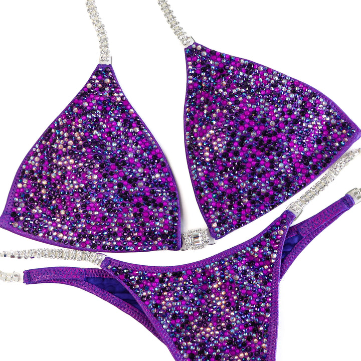 QS ST: Neon Purple Breeze Radiance. Extra Large/Pro with Modest Rise.  Angel Competition BikinisThe best NPC Competition Suits for the Bikini Division, Fit Model Division Suits, and bodybuilding suits.