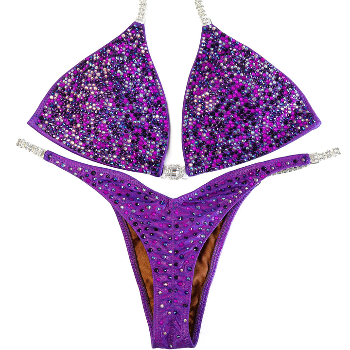 QS ST: Neon Purple Breeze Radiance. Extra Large/Pro with Modest Rise.  Angel Competition BikinisThe best NPC Competition Suits for the Bikini Division, Fit Model Division Suits, and bodybuilding suits.