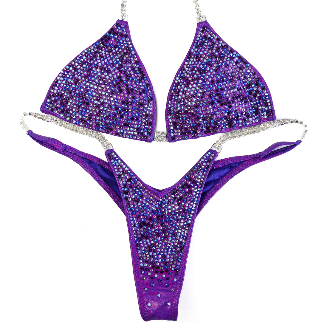 QS ST: Angel Pro Multi Color. Hologram Purple. Small/Wellness Pro.  Angel Competition BikinisThe best NPC Competition Suits for the Bikini Division, Fit Model Division Suits, and bodybuilding suits.