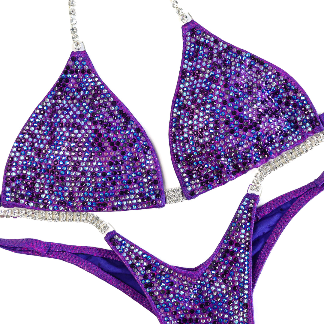 QS ST: Angel Pro Multi Color. Hologram Purple. Small/Wellness Pro.  Angel Competition BikinisThe best NPC Competition Suits for the Bikini Division, Fit Model Division Suits, and bodybuilding suits.