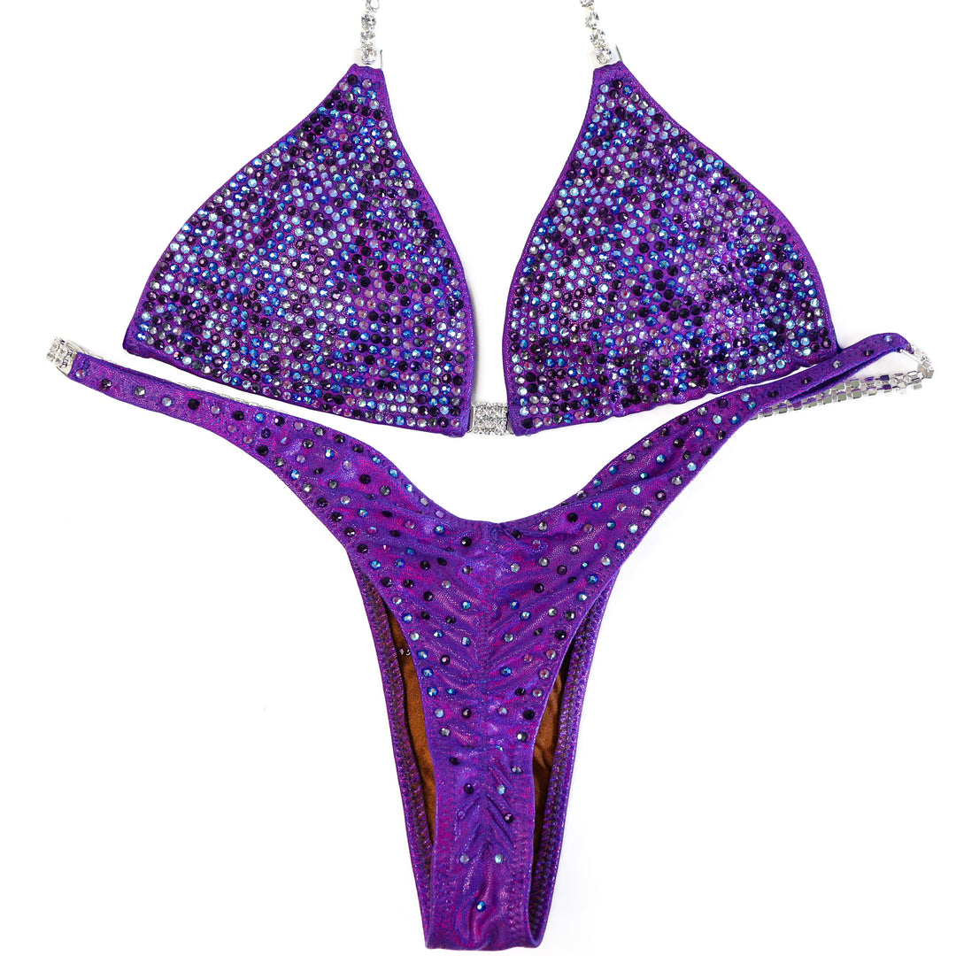 QS ST: Angel Pro Multi Color. Hologram Purple. Small/Wellness Pro.  Angel Competition BikinisThe best NPC Competition Suits for the Bikini Division, Fit Model Division Suits, and bodybuilding suits.