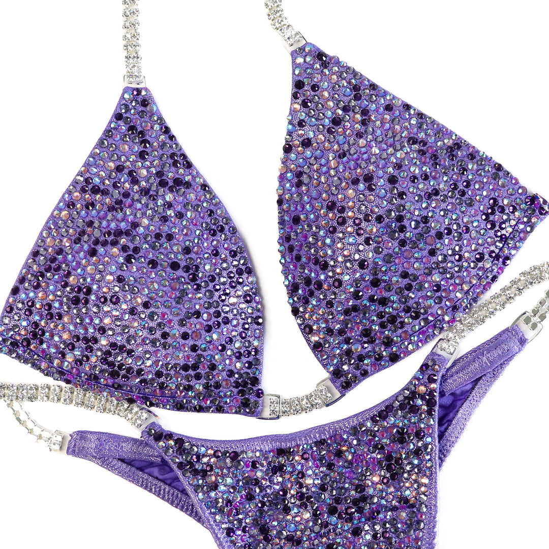 QS ST: Crystal Radiance. Hologram Lilac. Small Molded/Pro with Modest Rise.  Angel Competition BikinisThe best NPC Competition Suits for the Bikini Division, Fit Model Division Suits, and bodybuilding suits.