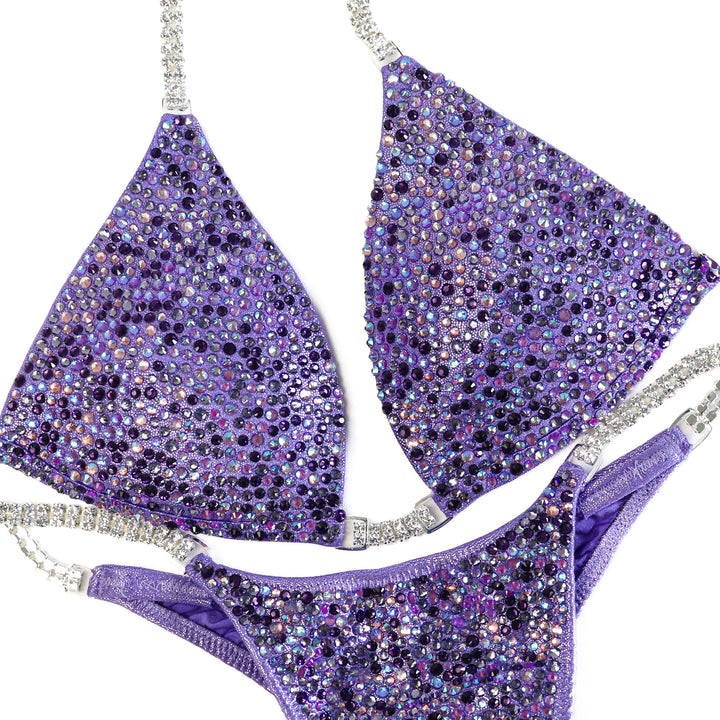 QS ST: Crystal Radiance. Hologram Lilac. Small Molded/Pro with Modest Rise.  Angel Competition BikinisThe best NPC Competition Suits for the Bikini Division, Fit Model Division Suits, and bodybuilding suits.