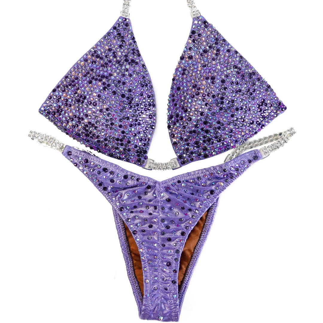 QS ST: Crystal Radiance. Hologram Lilac. Small Molded/Pro with Modest Rise.  Angel Competition BikinisThe best NPC Competition Suits for the Bikini Division, Fit Model Division Suits, and bodybuilding suits.