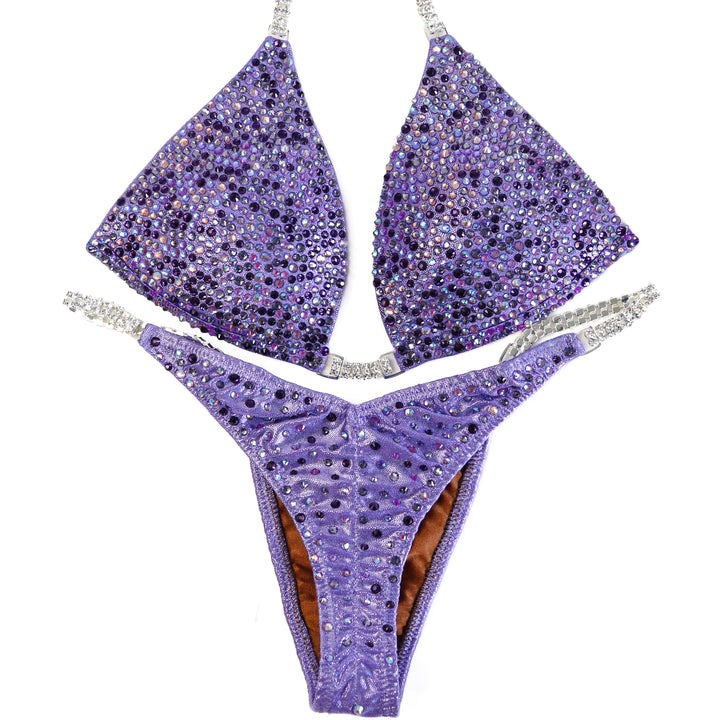 QS ST: Crystal Radiance. Hologram Lilac. Small Molded/Pro with Modest Rise.  Angel Competition BikinisThe best NPC Competition Suits for the Bikini Division, Fit Model Division Suits, and bodybuilding suits.