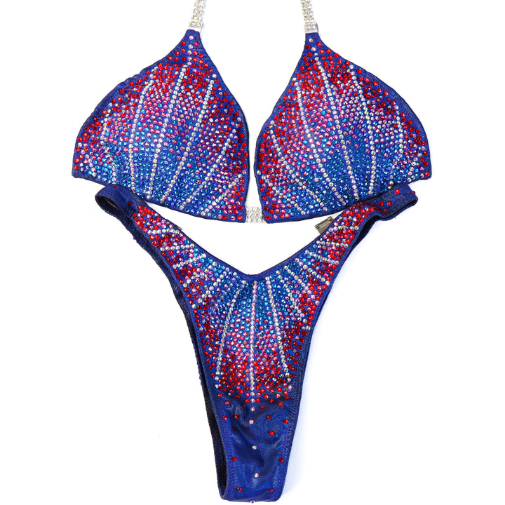 Pre Owned: Crystal Cosmo. Hologram Electric Purple. Medium/Standard Figure.  Angel Competition BikinisThe best NPC Competition Suits for the Bikini Division, Fit Model Division Suits, and bodybuilding suits.