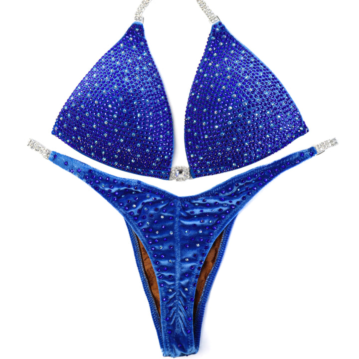 QS ST: Blue Velvet Angel Shimmer. Medium Molded/Pro with Modest Rise.  Angel Competition BikinisThe best NPC Competition Suits for the Bikini Division, Fit Model Division Suits, and bodybuilding suits.