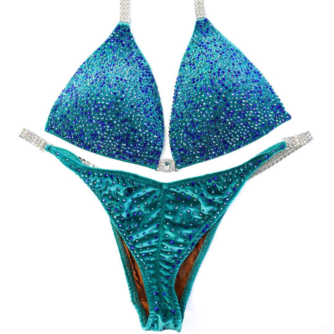 QS ST: Peacock Velvet Radiance. Large Molded/Brazilian with Extra Modest Rise.  Angel Competition BikinisThe best NPC Competition Suits for the Bikini Division, Fit Model Division Suits, and bodybuilding suits.