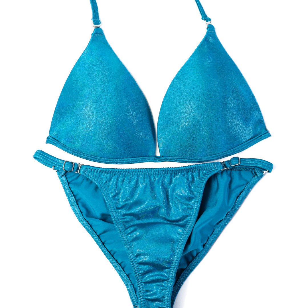 Pre Owned: Hologram Turquoise Fit Model Suit. Small Molded/Fit Model 2.  Angel Competition BikinisThe best NPC Competition Suits for the Bikini Division, Fit Model Division Suits, and bodybuilding suits.