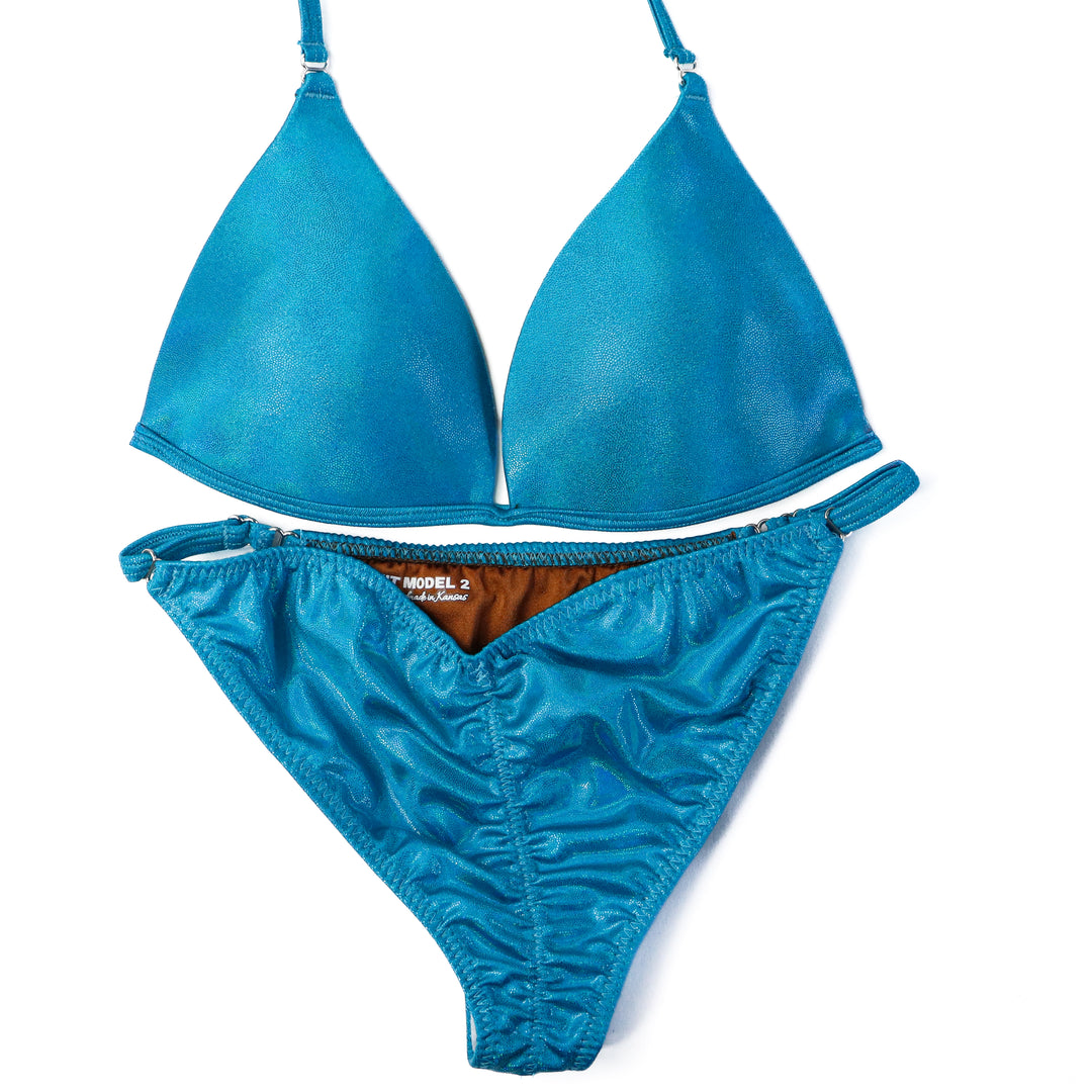 Pre Owned: Hologram Turquoise Fit Model Suit. Small Molded/Fit Model 2.  Angel Competition BikinisThe best NPC Competition Suits for the Bikini Division, Fit Model Division Suits, and bodybuilding suits.