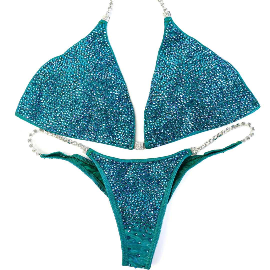QS ST: Casey's Blue Zircon Radiance. Extra Large/Pro.  Angel Competition BikinisThe best NPC Competition Suits for the Bikini Division, Fit Model Division Suits, and bodybuilding suits.