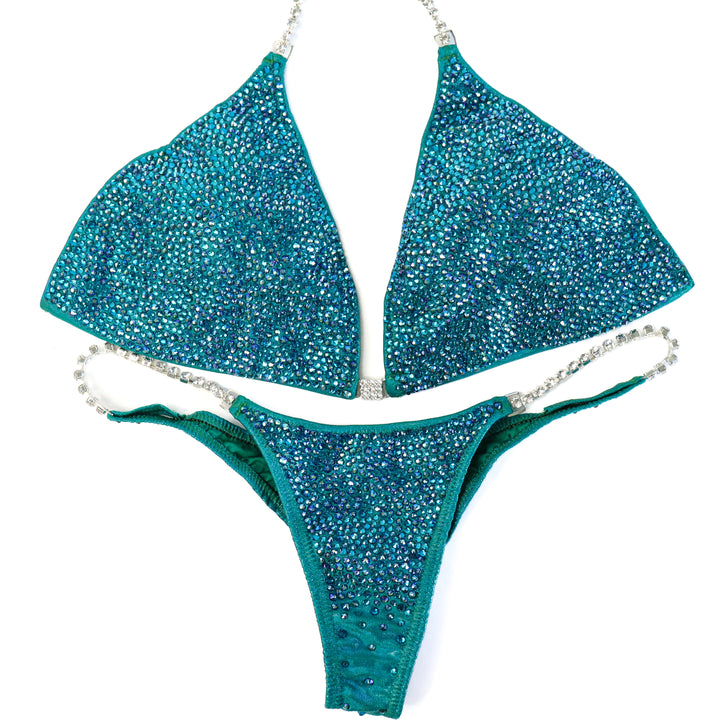 QS ST: Casey's Blue Zircon Radiance. Extra Large/Pro.  Angel Competition BikinisThe best NPC Competition Suits for the Bikini Division, Fit Model Division Suits, and bodybuilding suits.