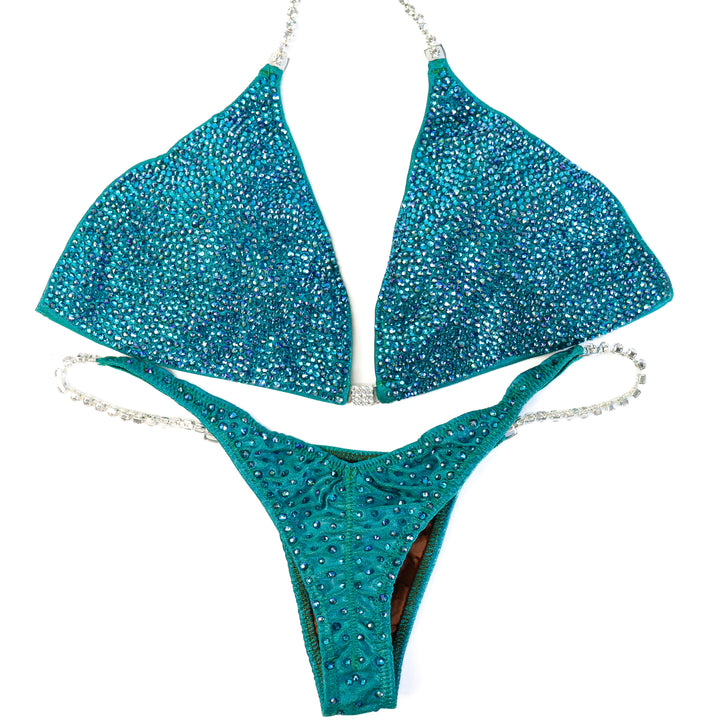 QS ST: Casey's Blue Zircon Radiance. Extra Large/Pro.  Angel Competition BikinisThe best NPC Competition Suits for the Bikini Division, Fit Model Division Suits, and bodybuilding suits.